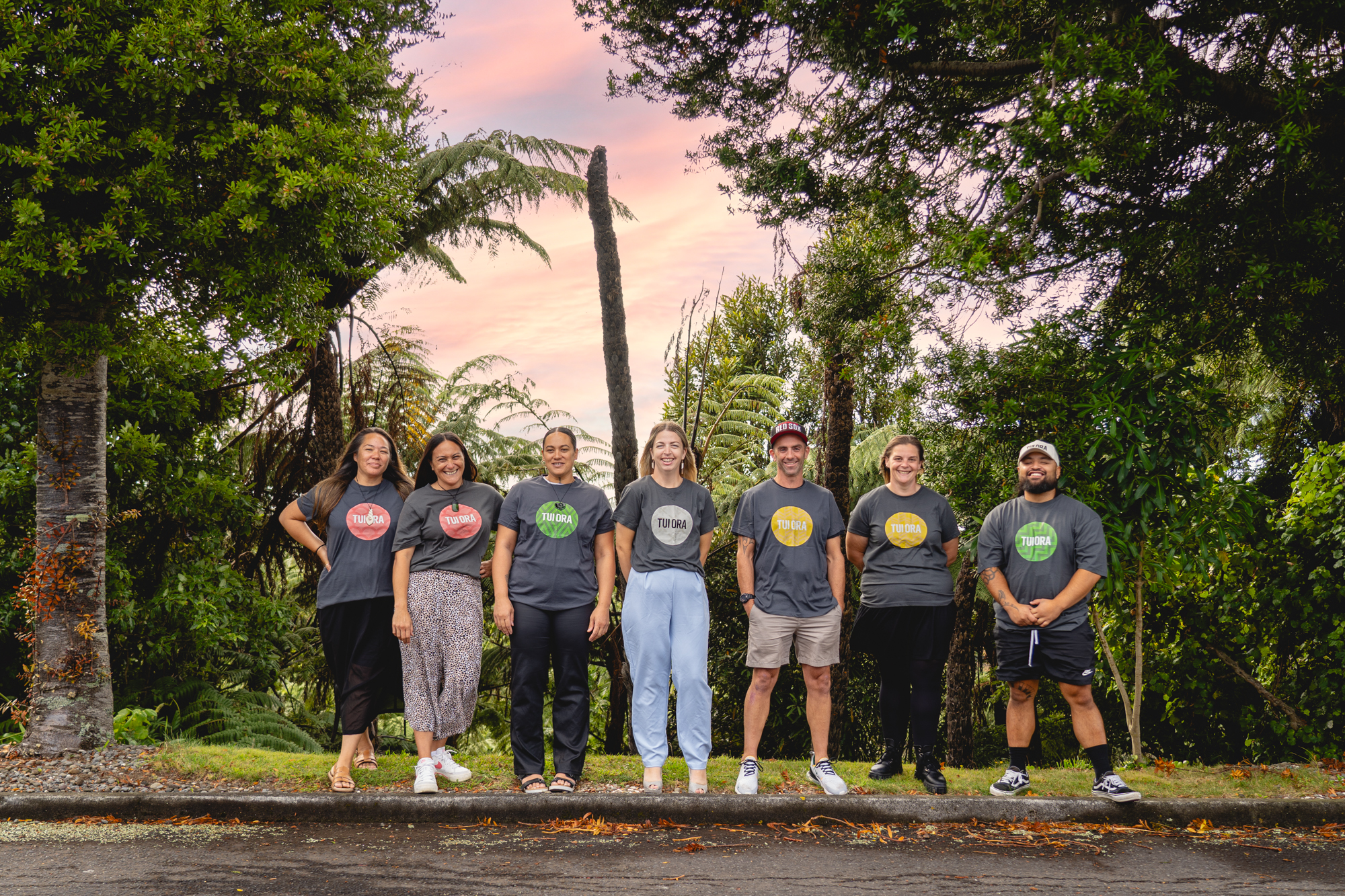 Kaimahi lined up wearing Tui Ora t-shirts